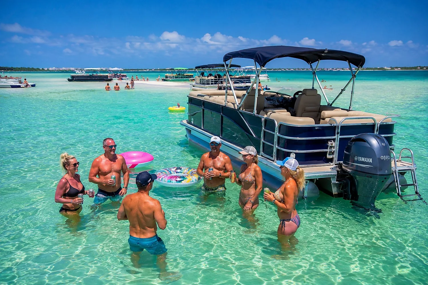 Boats anchored at the John's Pass sandbar on a sunny day